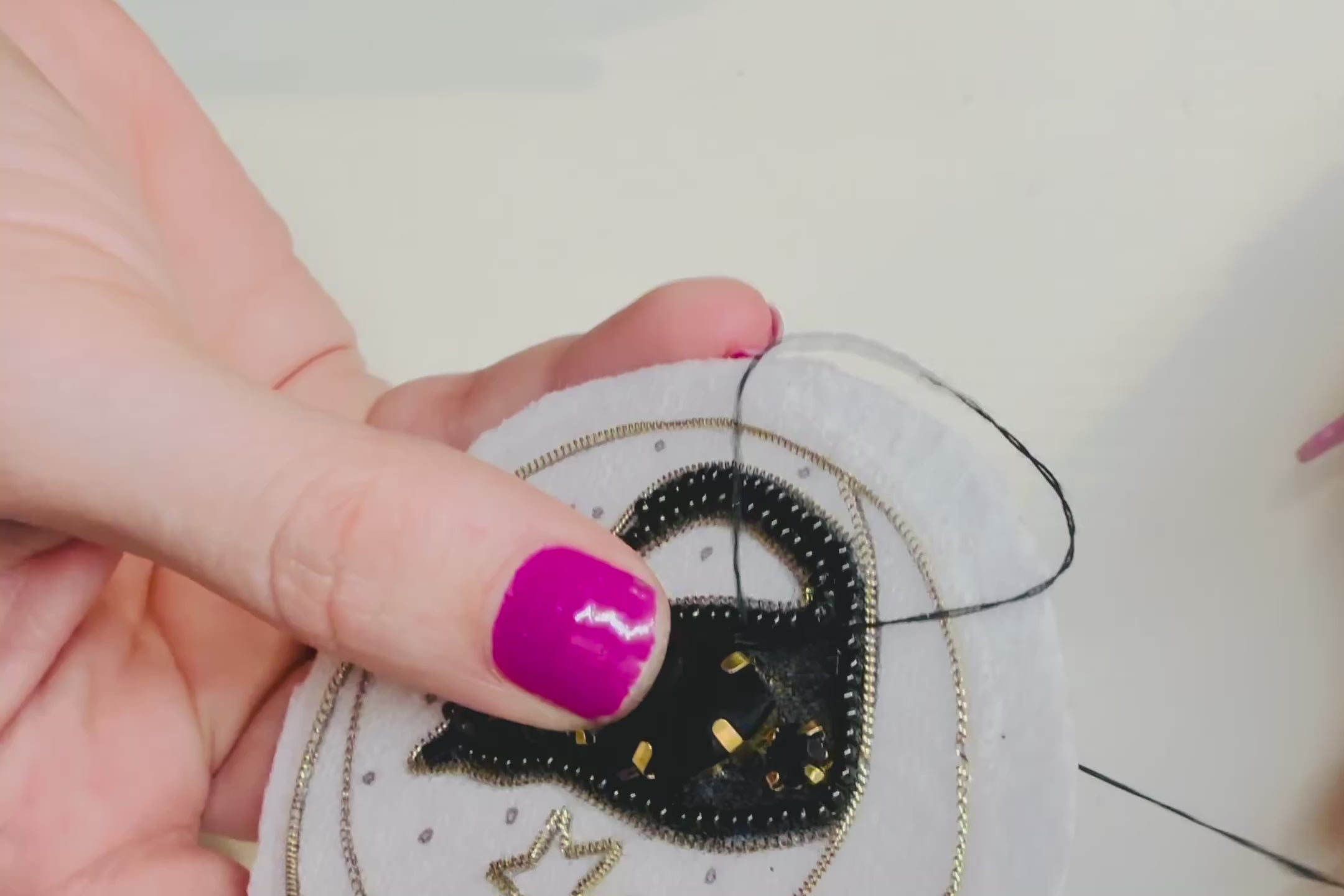 Load video: Crafted to dazzle, stitched to last.  Each pair is delicately hand-embroidered with crystals, sequins and vibrant colour because your earrings should reflect your sparkle.